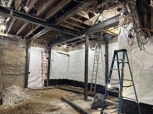 Basement Waterproofing with vapor barrier and new support beams.-1